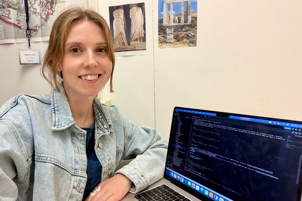 Amelia at work at her desk