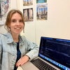 Amelia at work at her desk